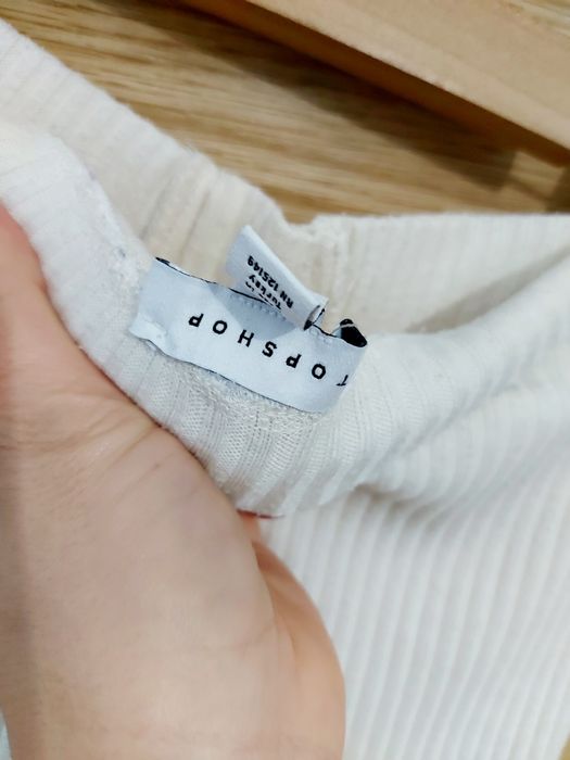 Kremowe prążkowane getry dzwony spodnie z wysokim stanem roz 34 Zara