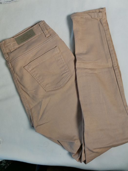 Spodnie xs 34 butik beżowe nude