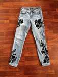 Śliczne spodnie  jeans w czarne kwiaty
