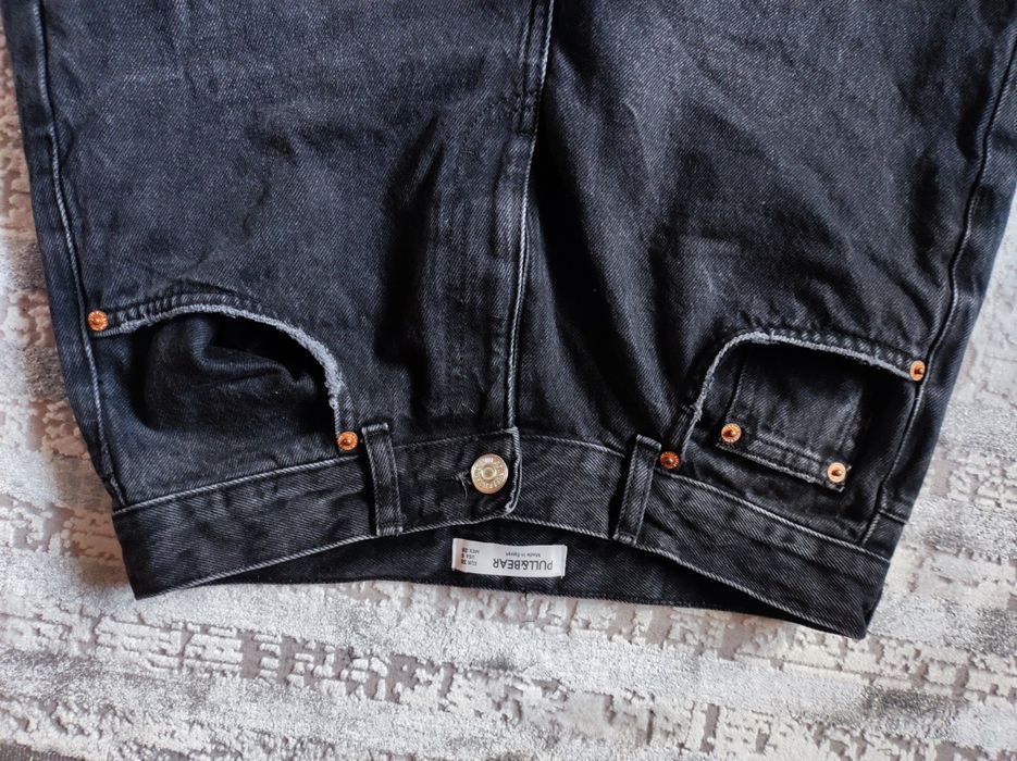 Spodnie z wysokim stanem szerokiemu nogawki