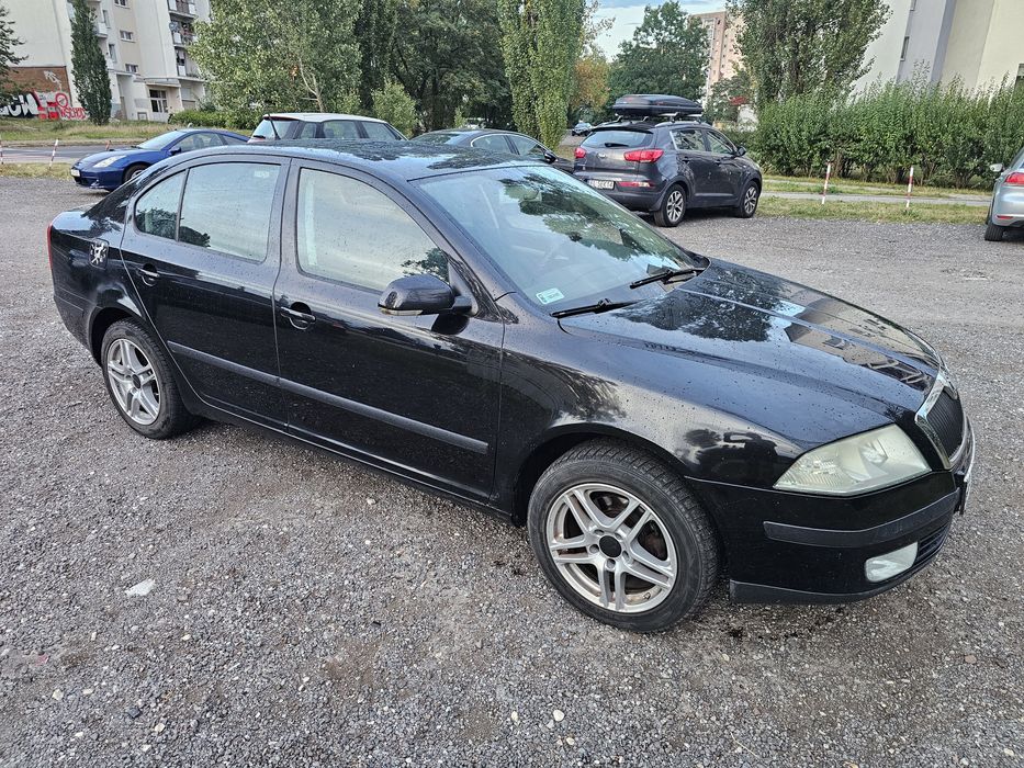 Skoda Octavia II Lift 1.6 MPi LPG > Klimatyzacja > Alufelgi > Czuj
