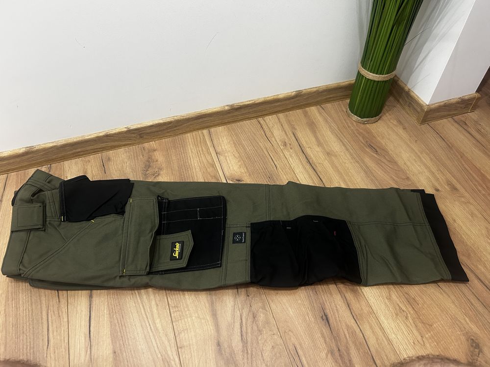 spodnie robacze Snickers 3314 zielone Canvas+ 092
