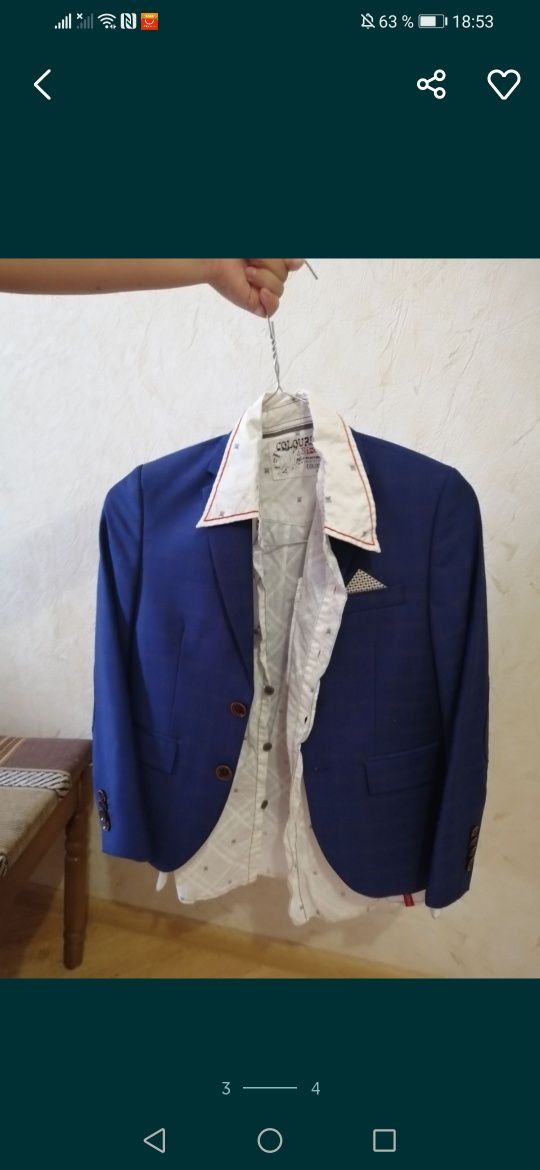 Продам классный фирменный пиджак  на мальчика