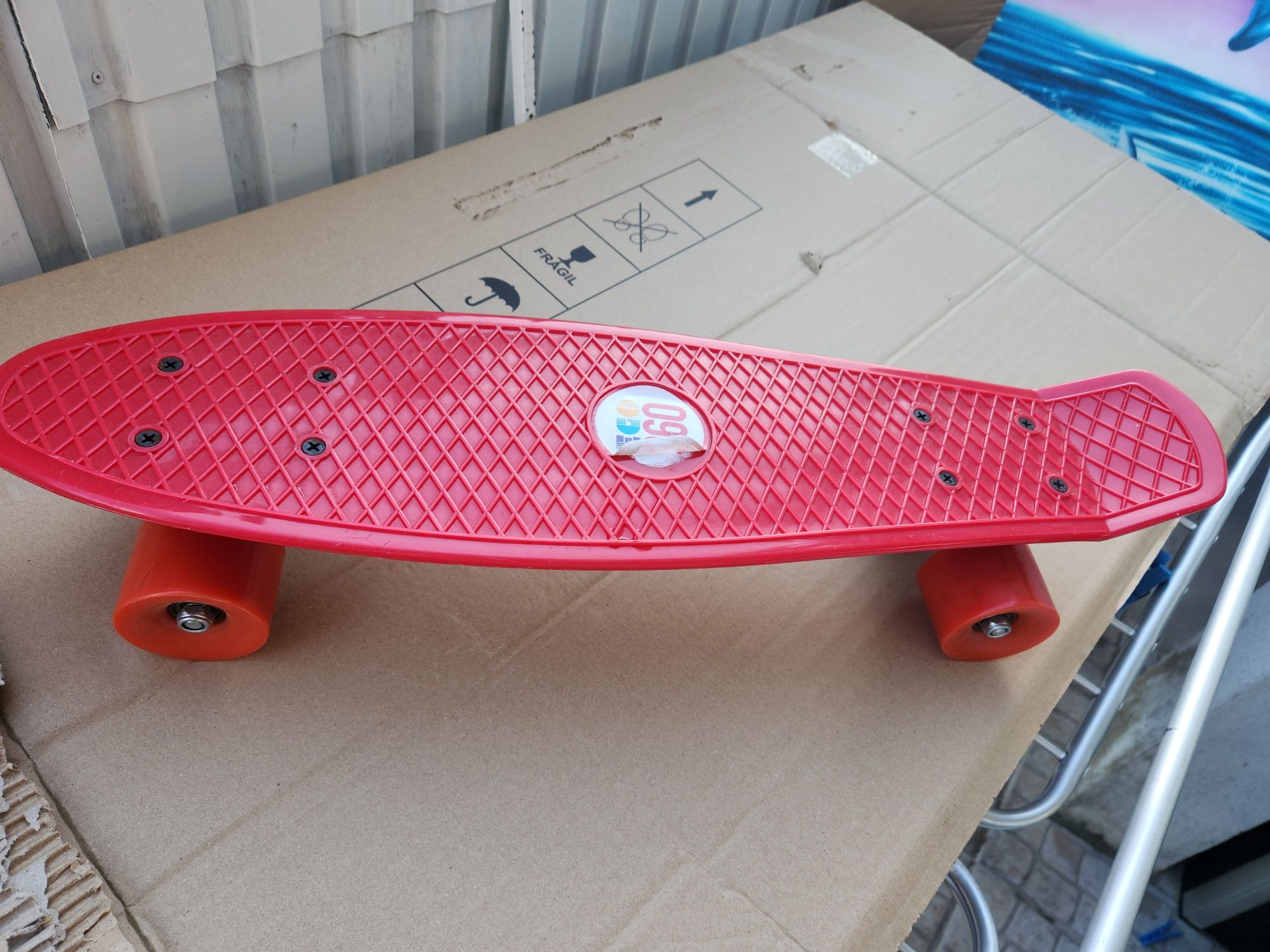 SKATE NOVO Vermelho ainda instruções  por baixo