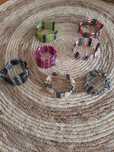Pulseiras ou colares