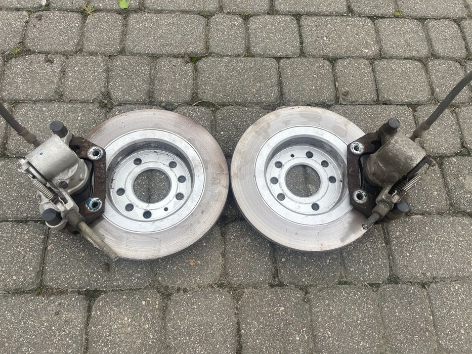 Tarcze klocki zacisk hamulcowy lewy prawy komplet VECTRA C SIGNUM SAAB 9-3 278CM BOSCH TYŁ