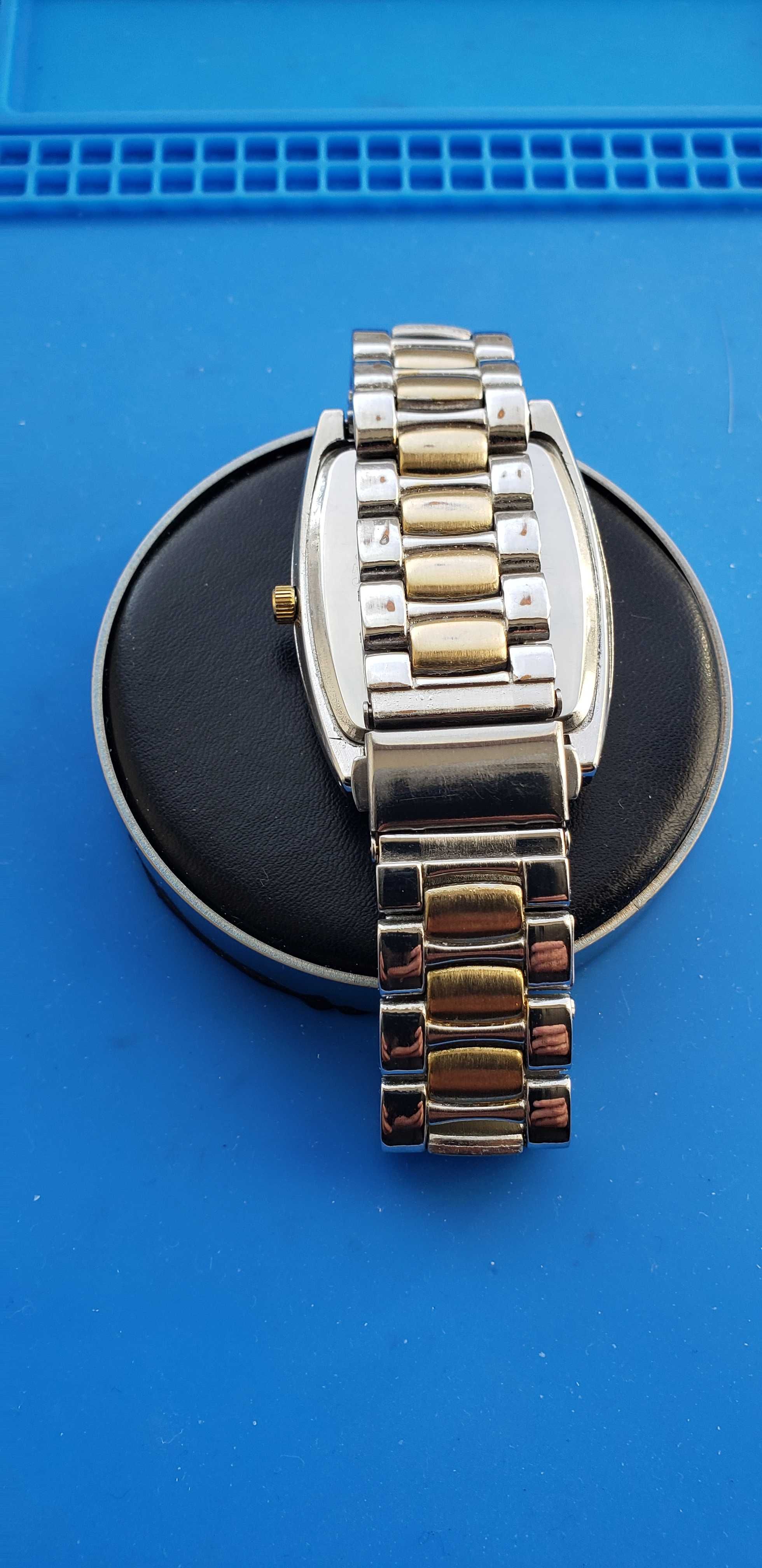 часы Louis Arden и женские часы Timex