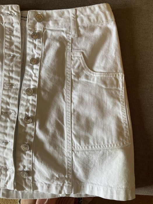 Saia de ganga branca com botoes à frente