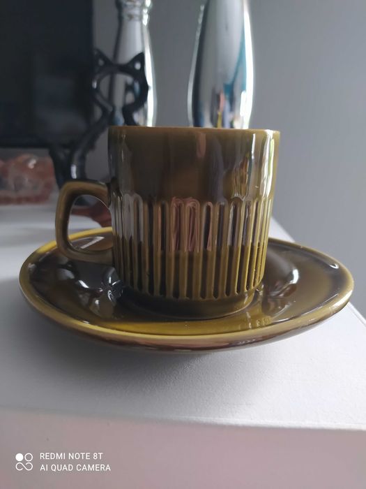 Kubek ze spodkiem nieużywany .