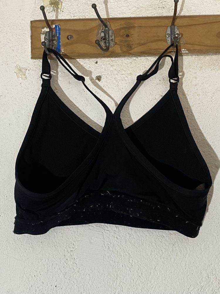 Top de desporto da Nike feminino