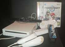 Nintendo Wii com comandos e jogos