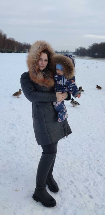 кожаний пуховик з натуральним мехом