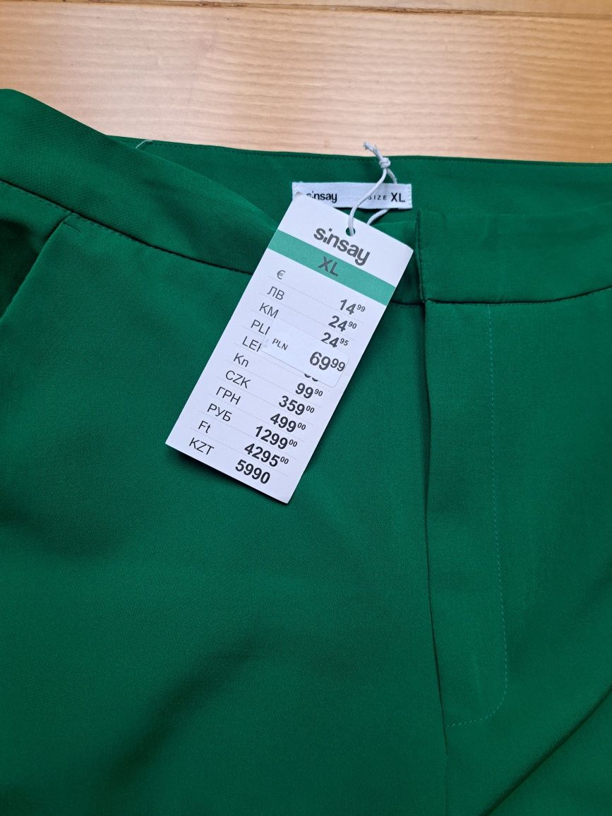 Nowe eleganckie  spodnie Sinsay r.L zielone