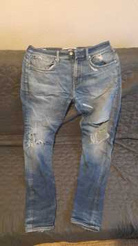 Calvin Klein jeansy rozm 33