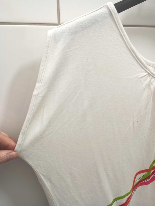 Śliczna biała bluzka, dzianina, aplikacja latawce. Solar