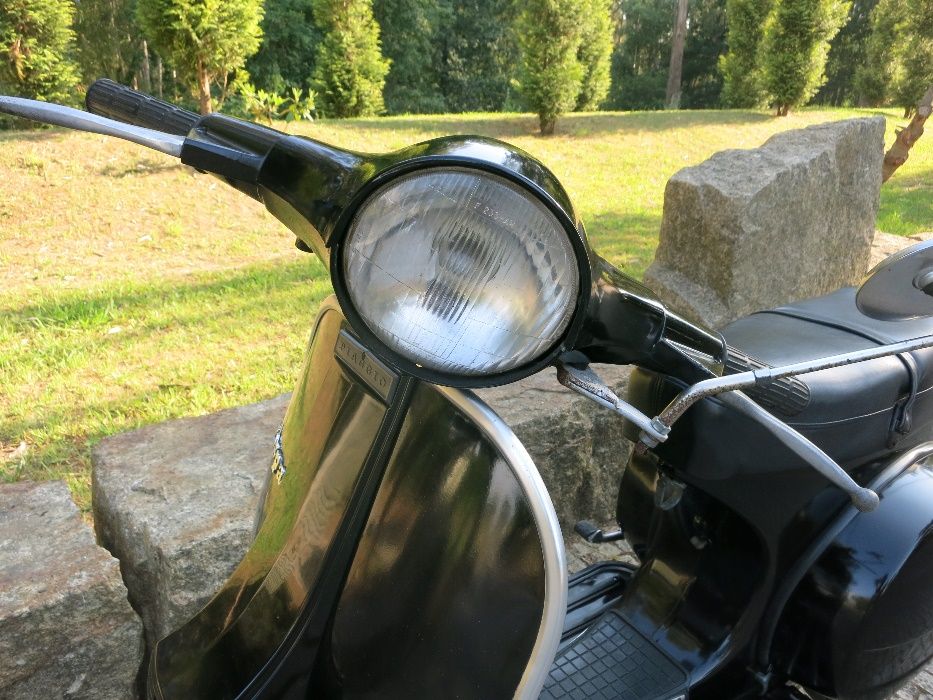 Vespa P125X                 .