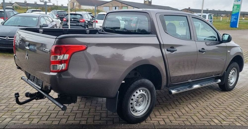 Бампер Mitsubishi L200 2014- разборка асх запчастини