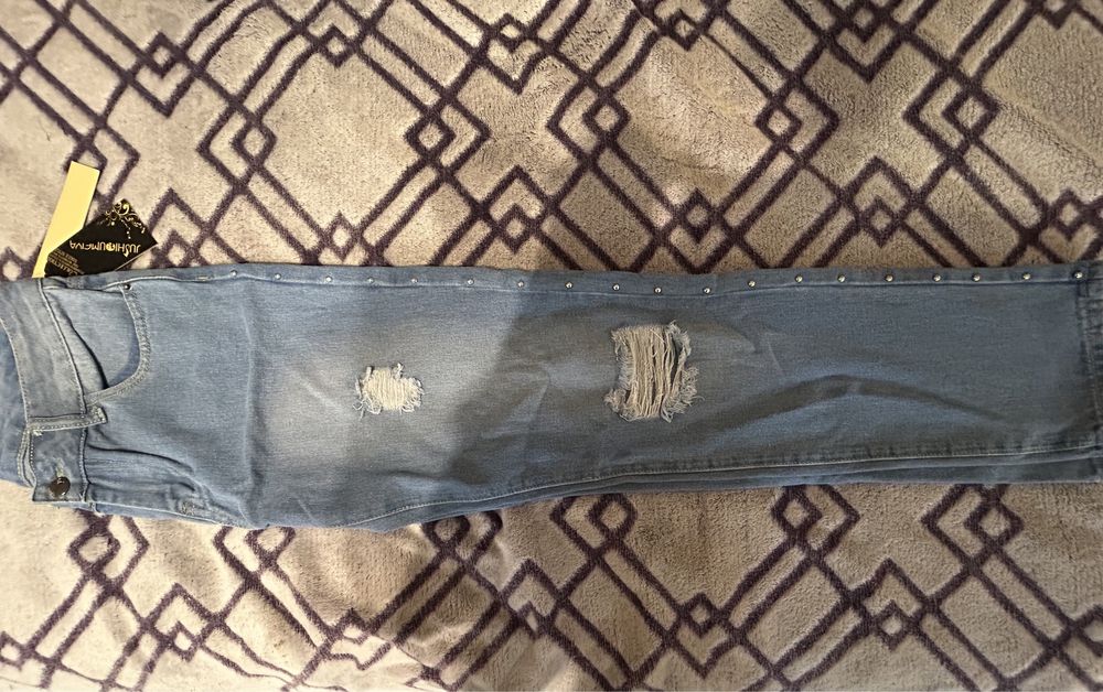 Нові жіночі джинси