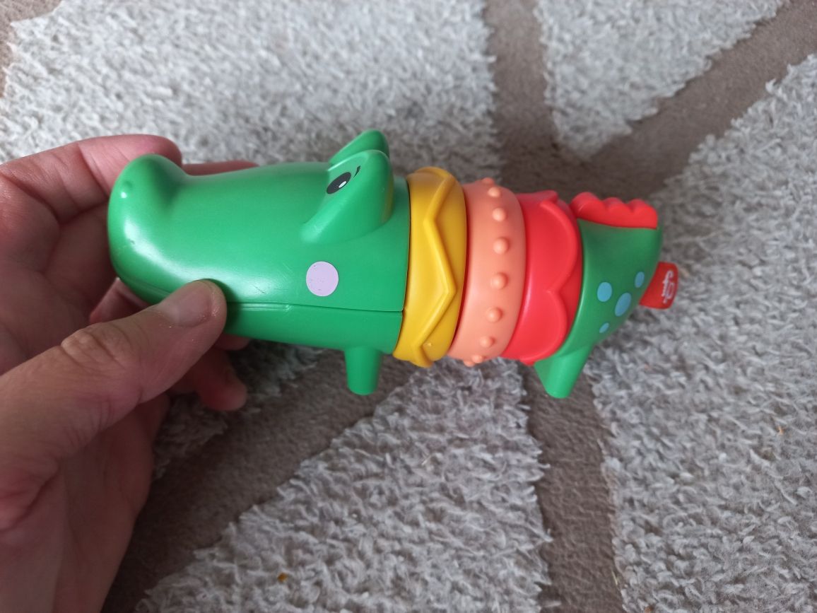 Grzechotki Skip Hop krokodyl klikający Fisher Price zabawki sensoryczn