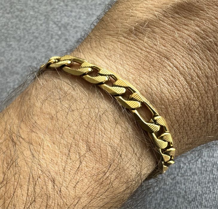 Bransoleta - męska kolor złota - figaro wzór - polecam !!!
