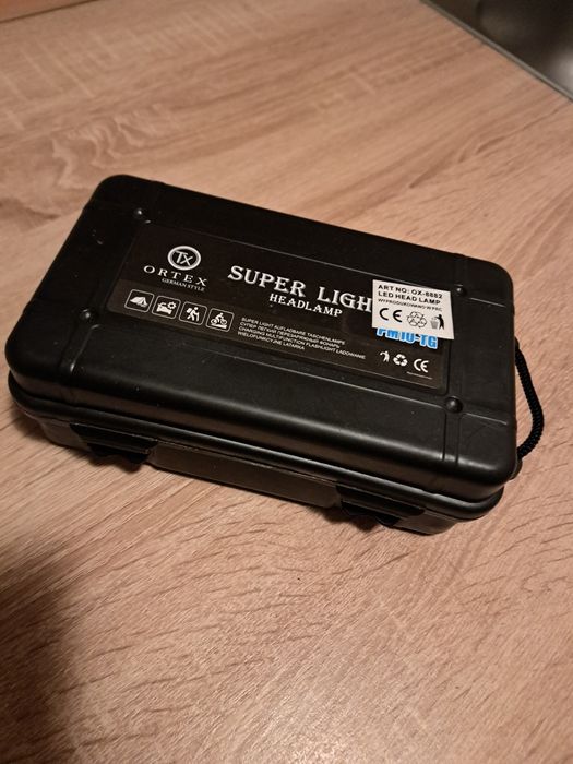 Ліхтарик налобний новий.