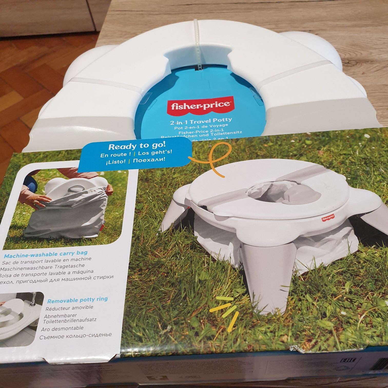 Sprzedam nowy nocnik  podróżniczy Fisher Price 2w1
