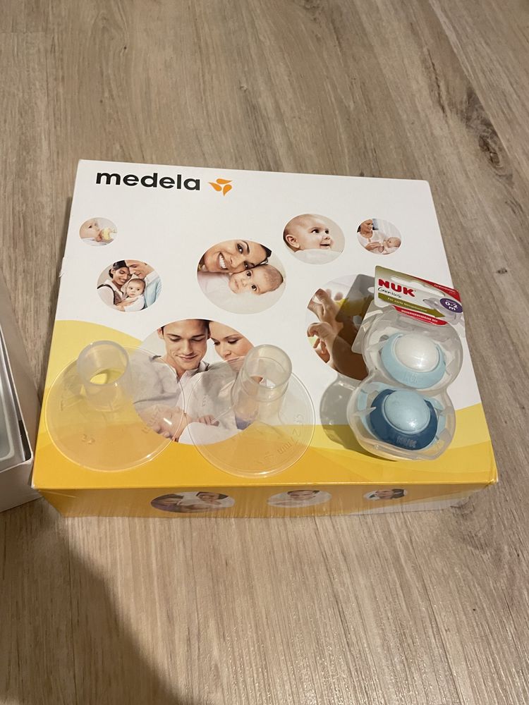 Молокоотсос Medela Mini Electric