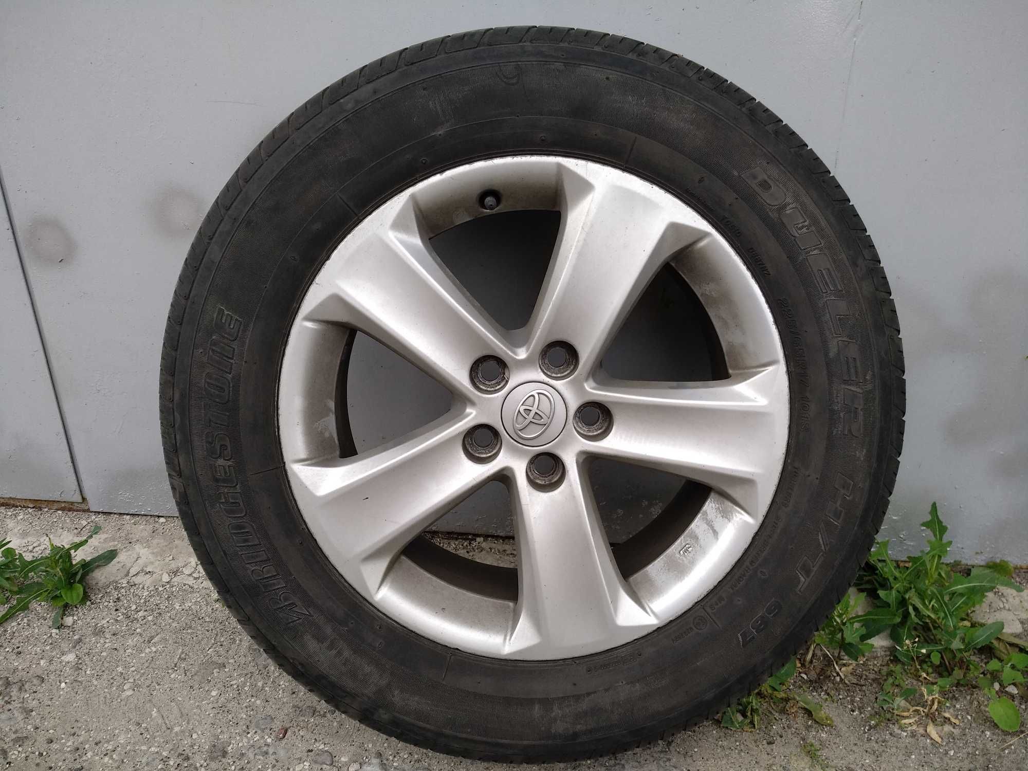 4 колеса: диски литі срібло, гума всесезонна Bridgestone Dueler
