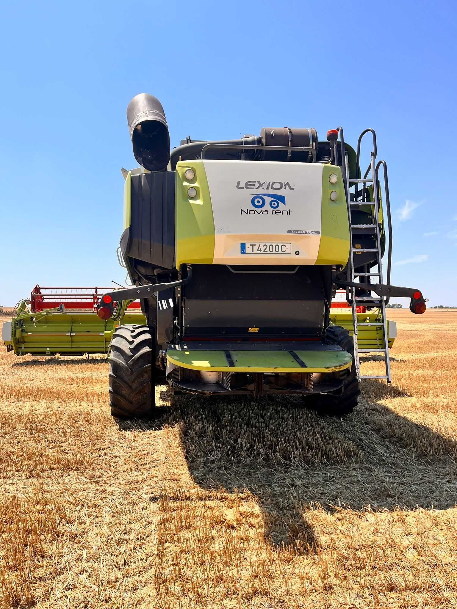 Claas Lexion 770TT, 2014 rok - 2450 godzin, autopilot, header V1050