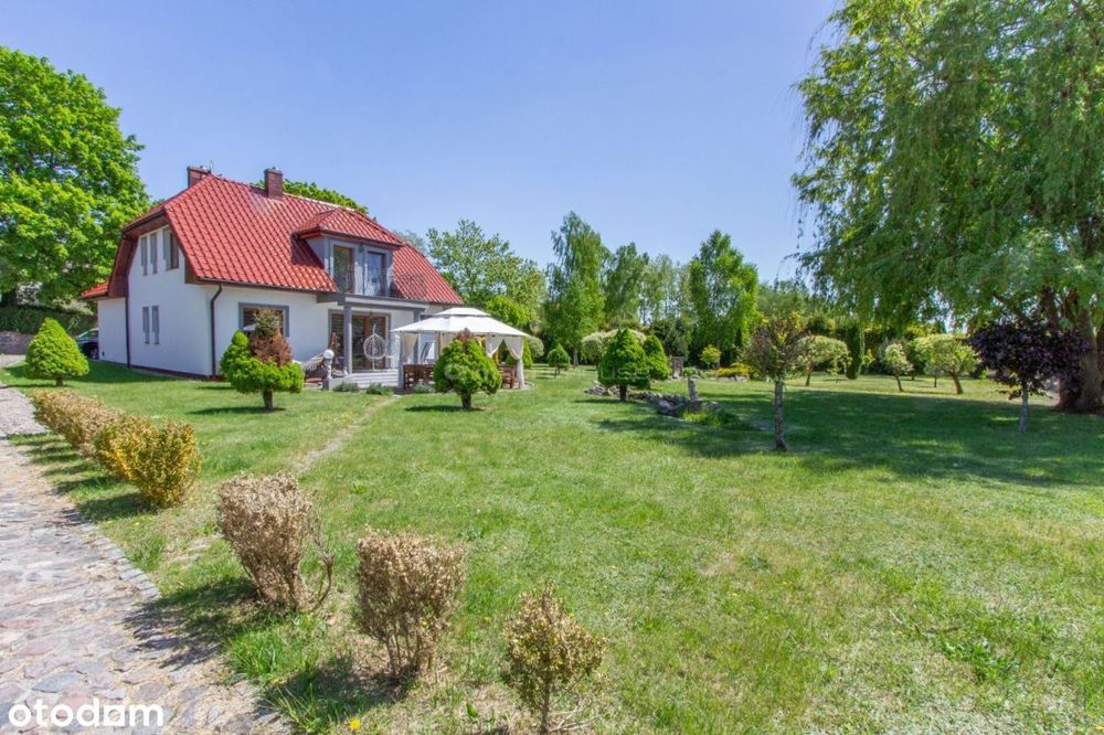 Komfortowy dom z pięknym ogrodem