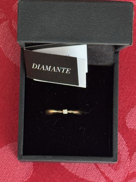 Anel ouro 18k e pedra diamante.