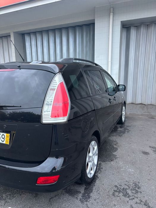 Mazda 5 7 lugares aceito troca por carro