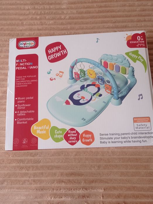 Музикальний розвиваючий килимок (центр)