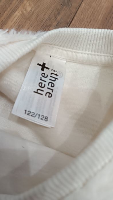 Bluza 122 - 128 kremowa typu miś dla dziewczynki C&A