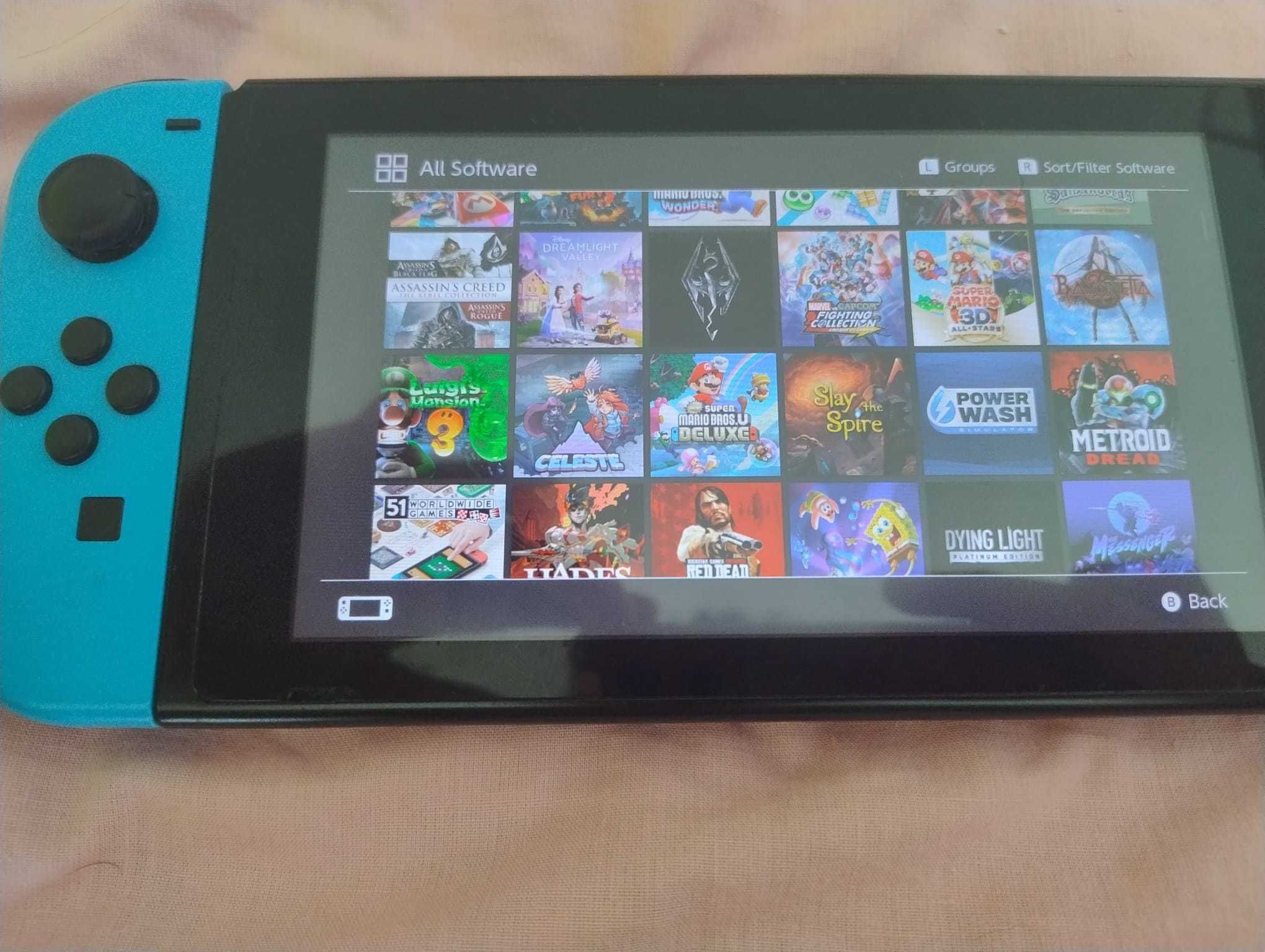 Nintendo Switch V2 Desbloqueado + microSD 1TB + 8bito adpter