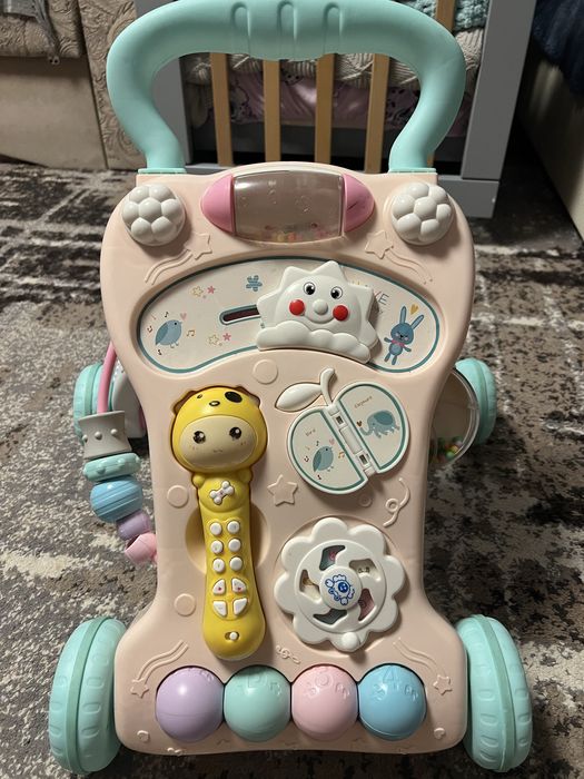 Продам толокар , ходунки в хорошому стані