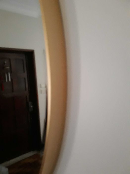 Espelho redondo dourado