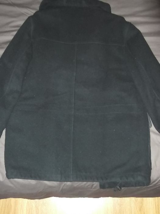 Vendo sobretudo em fazenda comprado nos armazéns Marques Soares