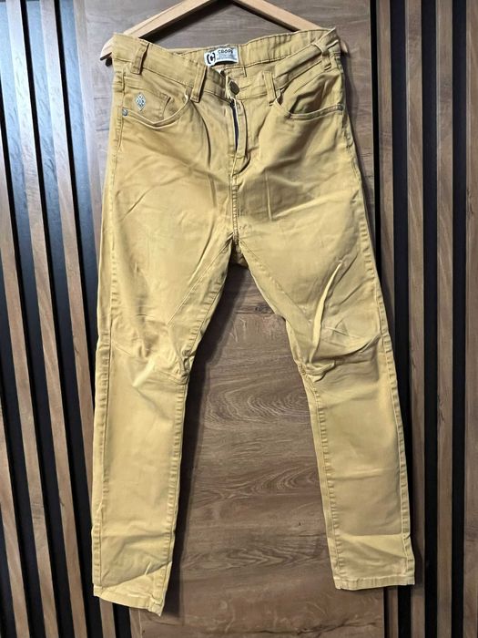 Miodowe musztardowe spodnie cropp 32