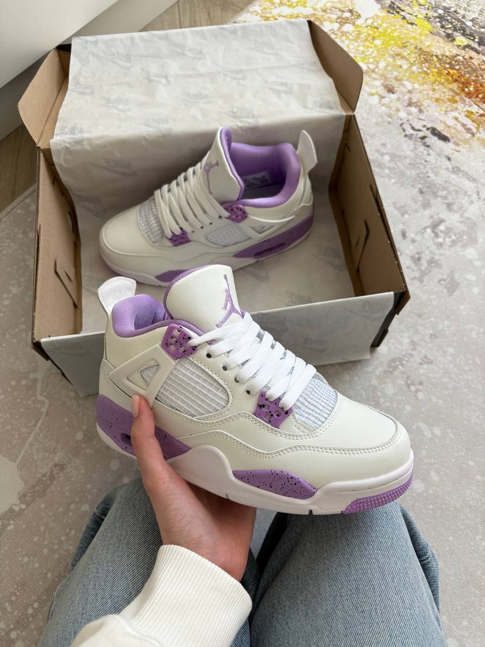 Jordan 4 персикові та фіолетові