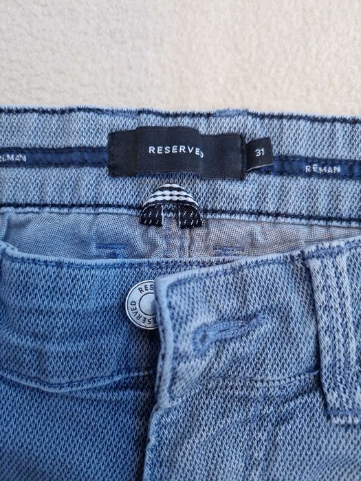 Spodnie chłopięce RESERVED rozm. 31