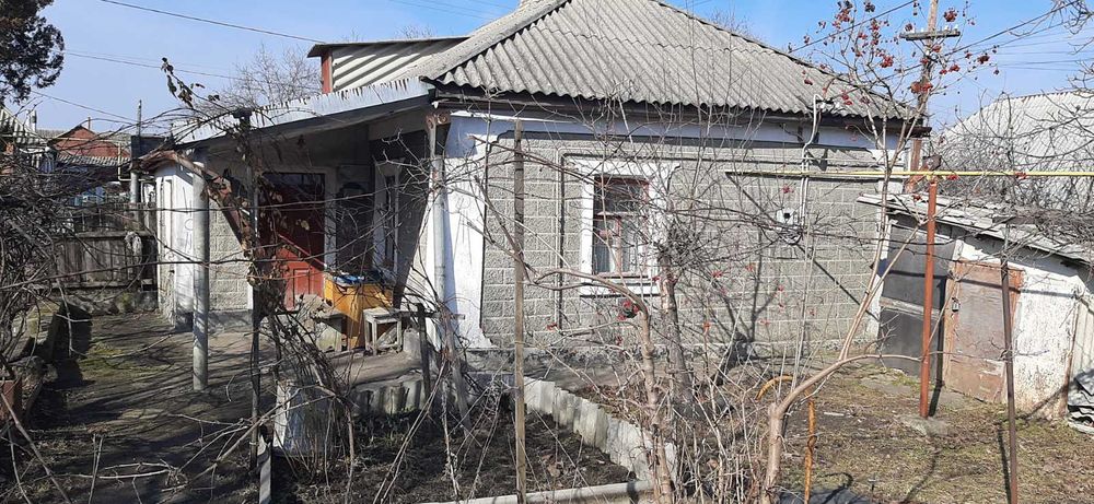 Продам пів будинку р-н. Базару