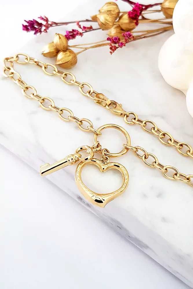 Złota bransoletka z wiszącymi kluczem i sercem 19 cm pr. 585