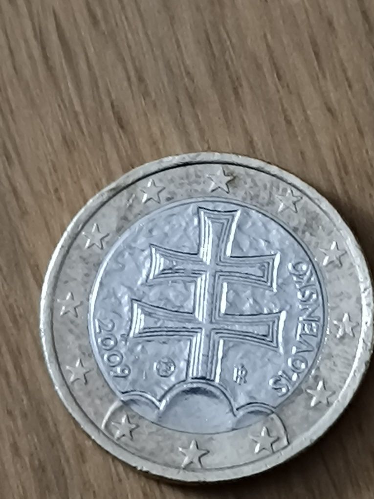 Moedas de 2002 de 1€ da Eslováquia e de 2009 de 0,50€ da Itália
