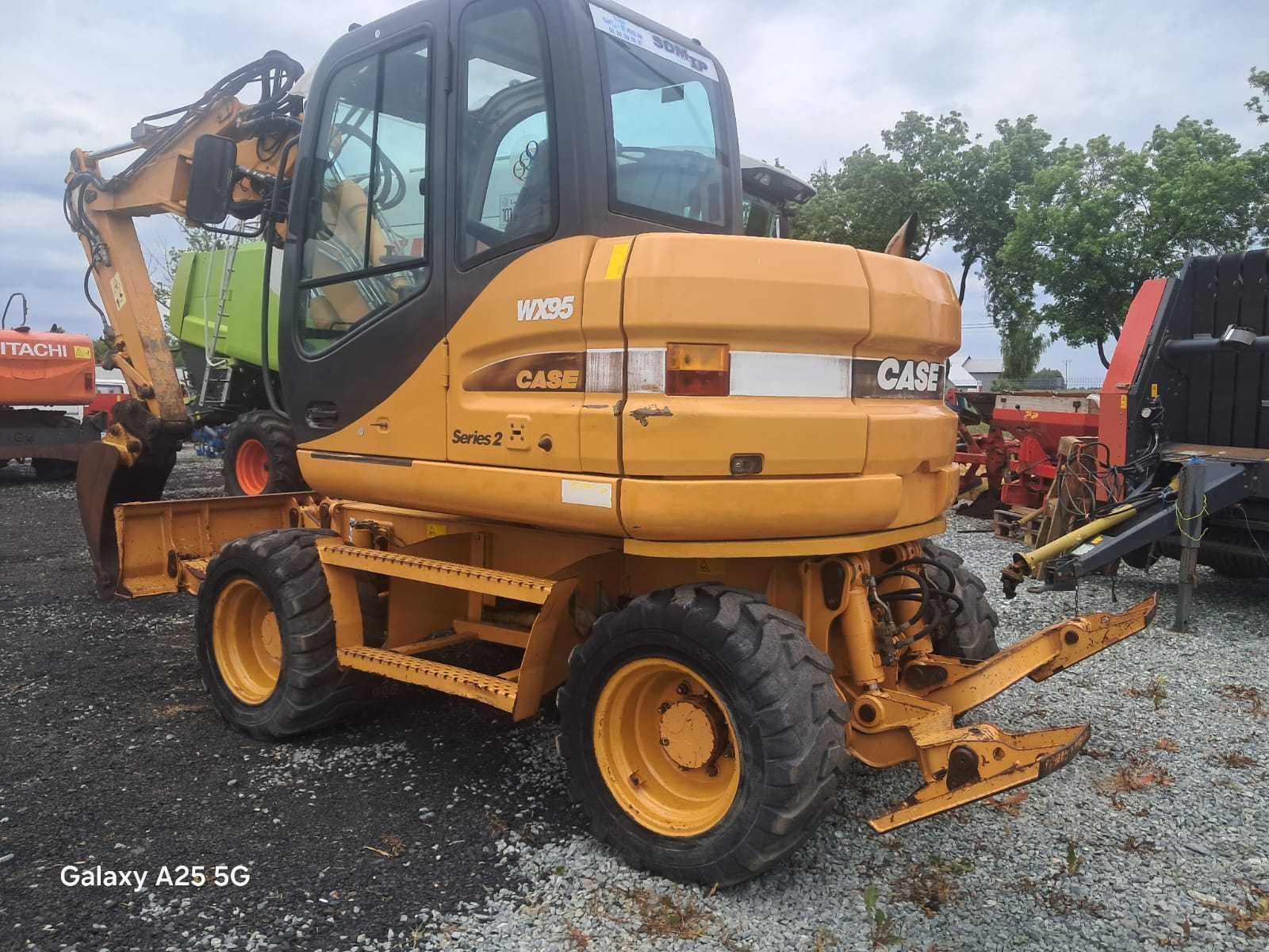 Koparka kołowa Case WX 95(Cat,Liebherr,Atlas),rok prod.2011
