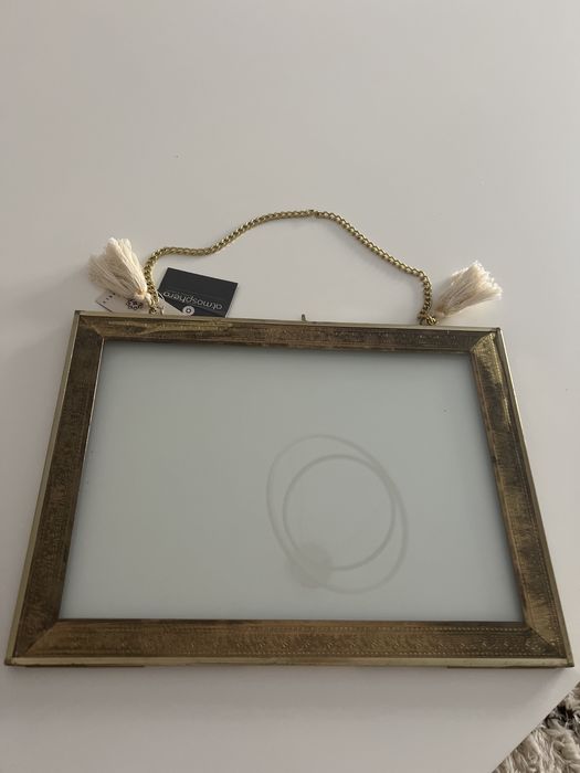 Moldura homa dourada nova