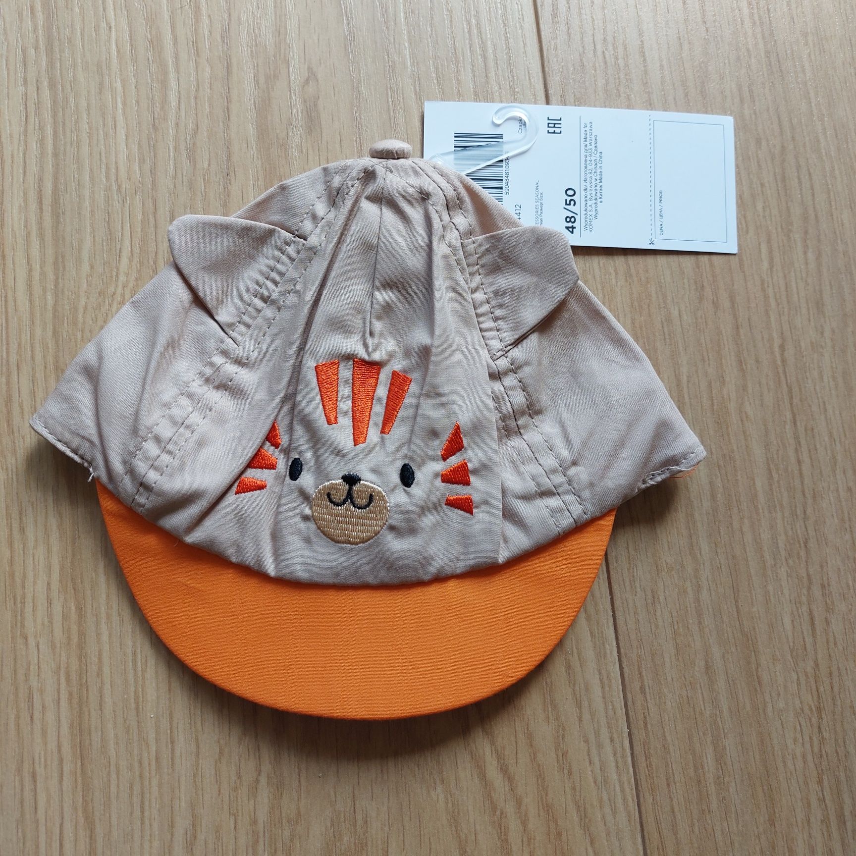 Nowa czapeczka przeciwsłoneczna