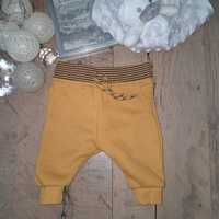 Zółte musztardowe spodnie dresowe Primak 0-3m