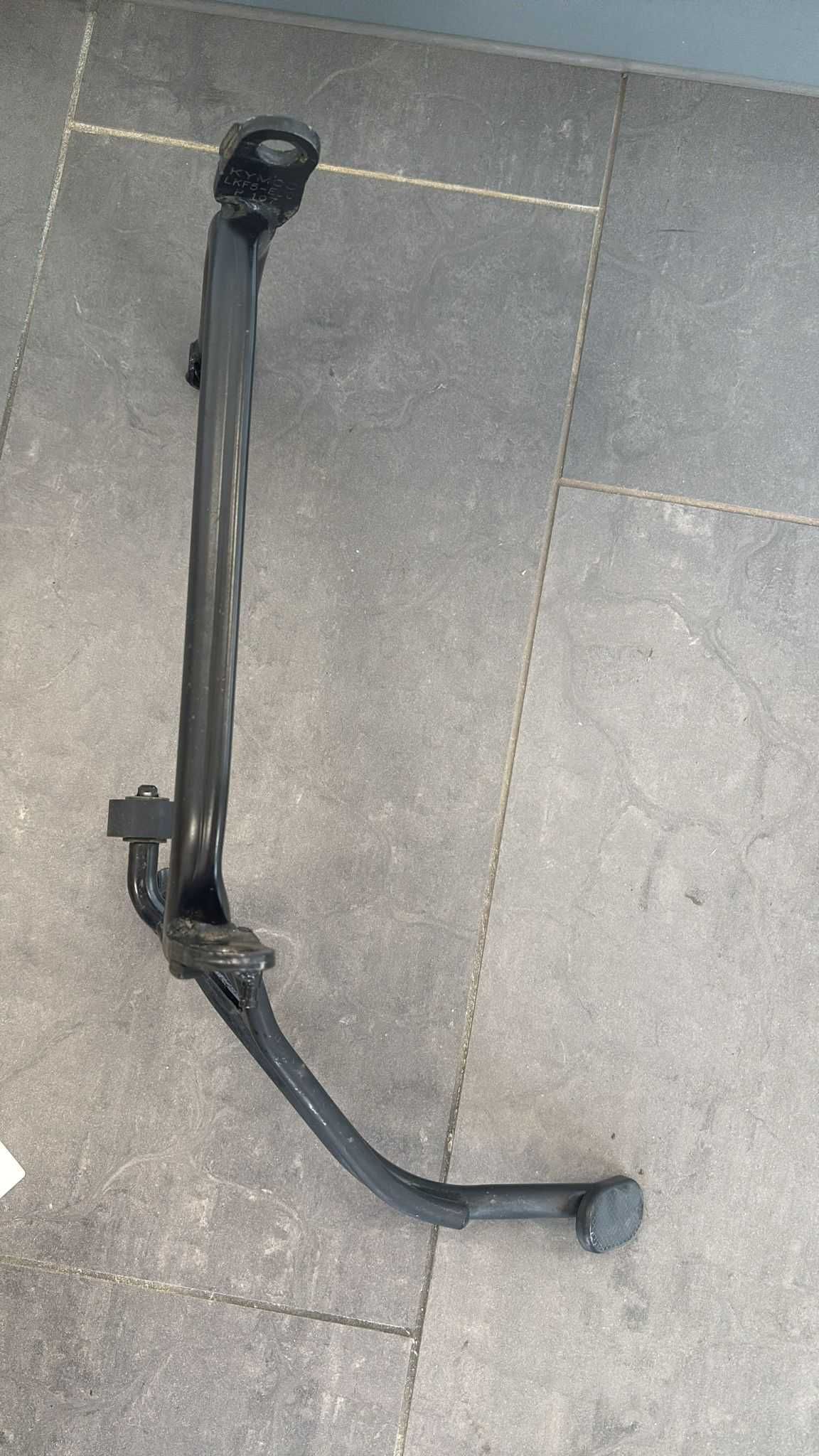 Nóżka Stopka Centralna Kymco Xciting 400 [1140]