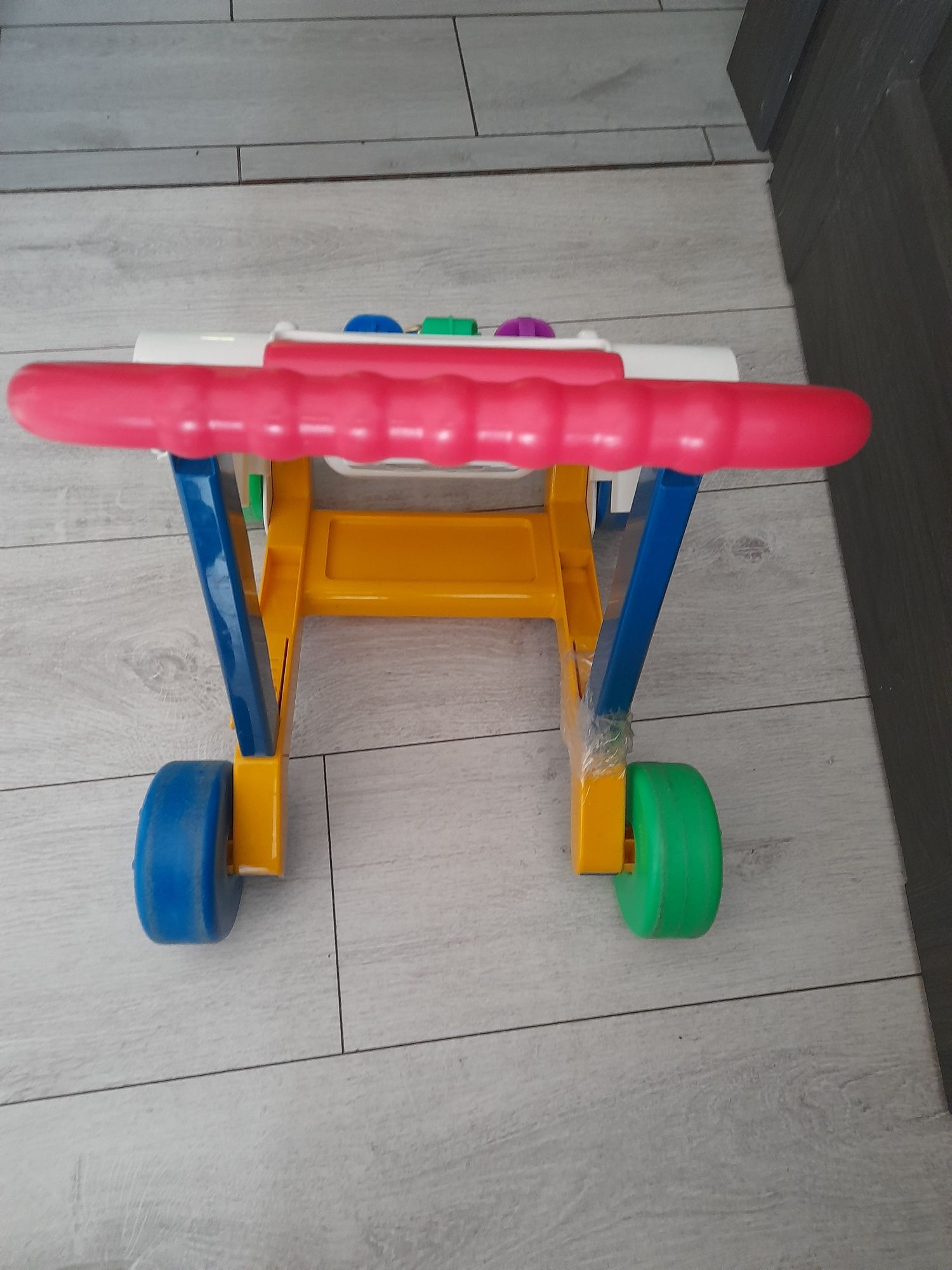 Pchacz jeździk Fisher Price